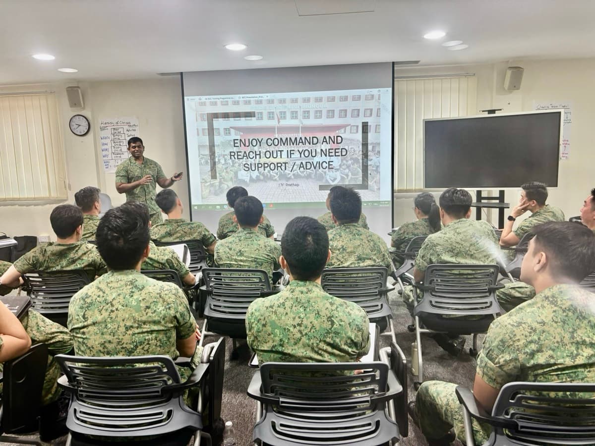 Prathap briefing a room of officers, crisis decisions rehearsed before pressure arrives